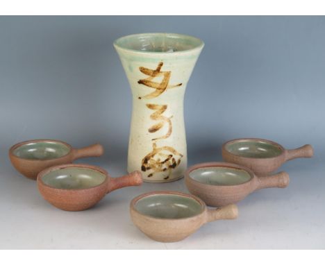 A Jeremy Leach Studio Pottery Vase with flared neck (17.5cm) and five Leach pottery handled bowls 