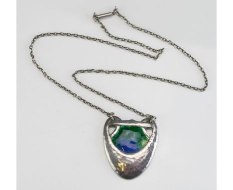 An Arts &amp; Crafts Planished Silver and Enamel Pendant (38.2mm drop) and on a 19.5" (49.5cm) chain with barrel clasp, unmar