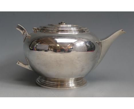 A George V silver teapot, maker Adie brothers Ltd, Birmingham, 1934, of plain circular form, lacks handle, 742gms, 23.87ozs