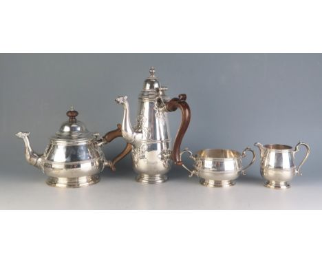 A George V silver three-piece tea service, maker Horace Woodward &amp; Co, Birmingham, 1920, of circular form with ribbed gir