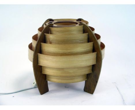 A Hans Agne Jakobsson designed table lamp, with segmented wood shade 25cm high,