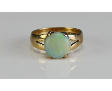 A 9ct Gold and Opal Ring, 9.1mm stone, size J, hallmarked, 3g