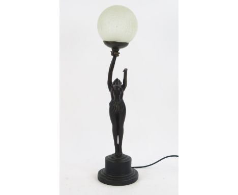 An Art Deco style bronzed figural table lamp, 'Ball Girl' on a circular base,