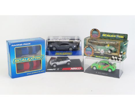 Scalextric Slot Car Group including The Power And The Glory C098 BRM in British Racing Green No. 5, Aston Martin DBS, New Bee