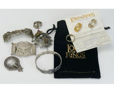 A Lord of The Rings 'The One Ring' with certificate, a Celtic style hinged silver bangle and other silver and white metal jew
