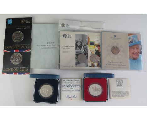 A Royal Mint Silver 1977 Silver Jubilee Crown and silver 1981 crown (both boxed with COAs), 2007 Diamond Wedding Crown pack, 