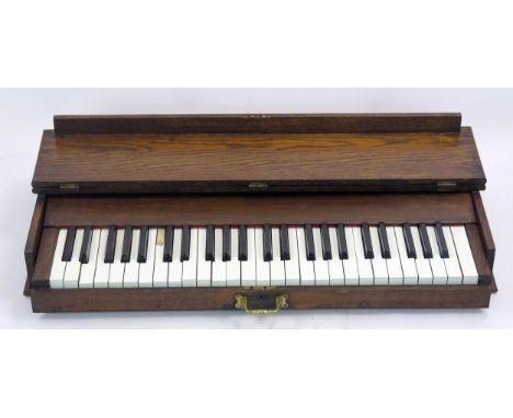 Late 18th or Early 19th Century Practice Piano, 4 octave keyboard contained within oak case, 78x34x10.5cm