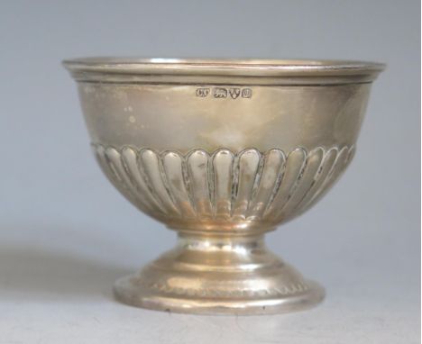 An Edward VII silver pedestal sugar basin, maker Charles Cooke, Chester, 1904, of circular form with half reeded decoration o