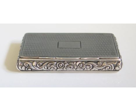A William IV silver snuff box, maker Edwin Jones, Birmingham, 1835, of rectangular form with engine turned and moulded foliat