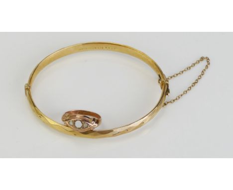 A Damaged 9ct Gold Ring, 1.79g and a 9ct gold metal core hinged bangle