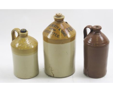 Three stoneware flagons, "George Henty &amp; Sons, Chichester", "W L Jones &amp; Sons Ltd, Exeter", and one unnamed other. (3