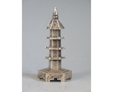 A Chinese novelty pepperette by Wang Hing &amp; Co, Hong Kong, in the form of a pagoda, 8cm high, 30gms,  0.99ozs