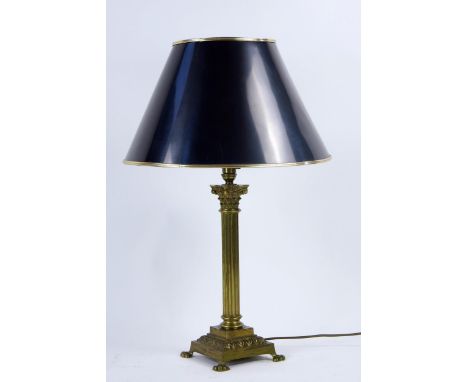 A gilt brass Corinthian column table lamp and shade, on a square base with paw feet, overall height 73cm.