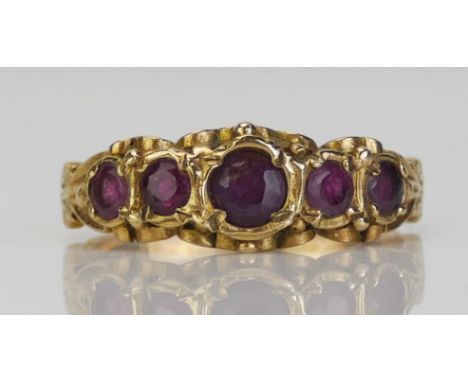 A 9ct Gold and Ruby Five Stone Ring, c. 3.95mm principal stone, size L.75, hallmarked, 2.78g