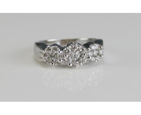 A 14K White Gold and Diamond Trilogy Cluster Ring, size N.5, 6.21g