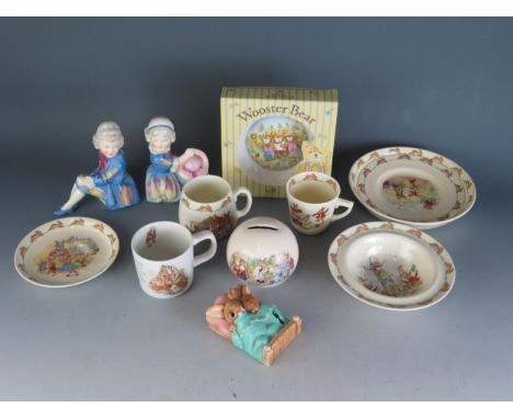 A collection of Royal Doulton 'Bunnykins' nursery wares including cups, saucers and bowls, and other ceramics.