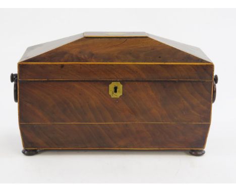 A 19th century mahogany and boxwood strung tea caddy of sarcophagus outline, the hinged lid enclosing a central glass blender