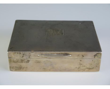A George V Silver Cigarette Box with engine turned decoration, 5x3.5in., London 1936