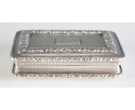 A George IV silver snuff box, maker Joseph Willmore, Birmingham, 1824, monogrammed, of rectangular outline with foliate borde