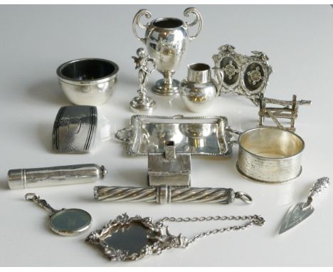 A mixed collection of silverwares, various makers and dates, includes, miniature trophy cup, napkin ring, picture frame, cher