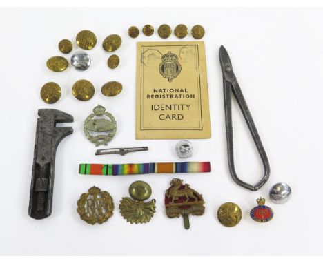 Assorted regimental badges, buttons. Identity Card, War Office issue adjustable wrench, etc.