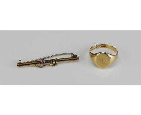 A 9ct Gold Signet Ring (size K.25, hallmarked, 2.62g) and a 9ct gold gem set foliate brooch (1.24g)