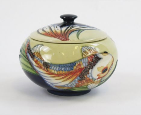 A Moorcroft pottery bowl and cover in Quiet waters pattern, to a cream ground, 14cm diameter. boxed.