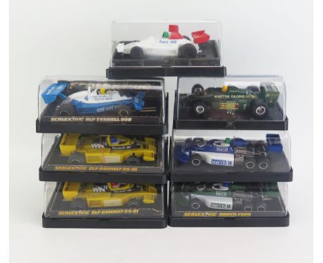 Scalextric Formula 1 Slot Cars Group of 7 including C131 March Ford x2 (blue and green) C134 Elf Renault RS-01 x2 (different 