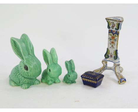 Three graduated Sylvac style rabbits together with continental candlestick and trinket box. 