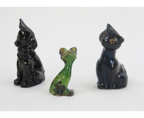 Three assorted pottery cats and dogs, possibly Barum pottery 9cm and 14cm high.