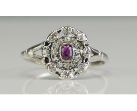 An Antique Platinum, Ruby and Old Cut Diamond Ring, c. 13.2x11.9mm head, size S, 3.18g
