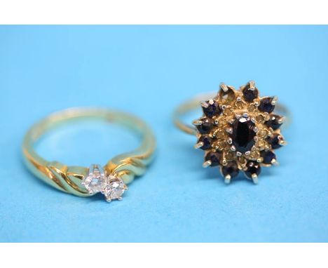 A 9ct gold diamond crossover ring and a sapphire cluster ring