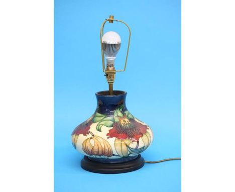 A modern Moorcroft squat shaped table lamp