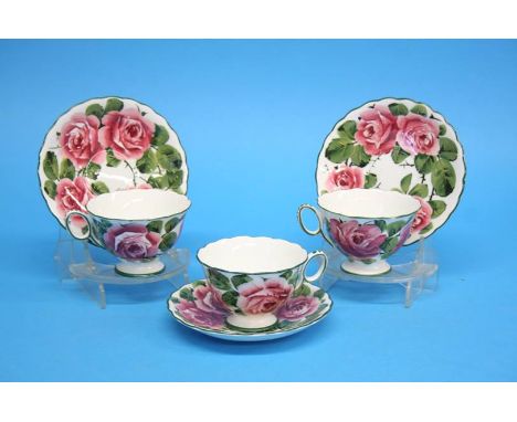 A set of three Wemys cups and saucers decorated with pink roses; green printed mark