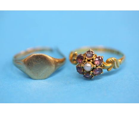 A 9ct gold ring and a 15ct gold ring, total weight 3.1gm