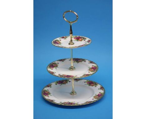 A Royal Albert 'Old Country Roses' tea service and a boxed Royal Albert doll