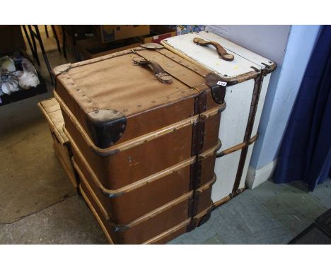 Two travelling trunks and a pine trunk