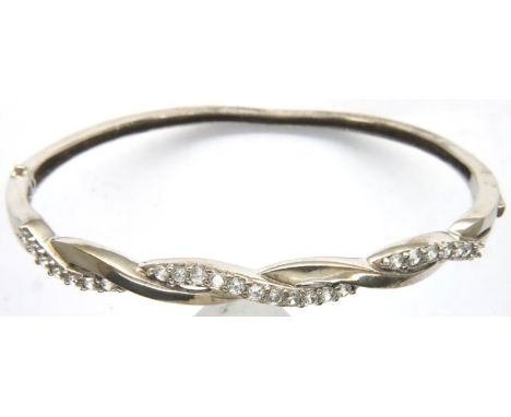 925 silver stone set hinged bangle, D: 55 mm, 9g, misshapen. P&amp;P Group 1 (£14+VAT for the first lot and £1+VAT for subseq