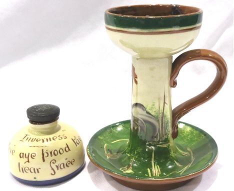 Torquay Motto ware candlestick and ink pot, H: 15 cm, some crazing throughout. P&amp;P Group 2 (£18+VAT for the first lot and