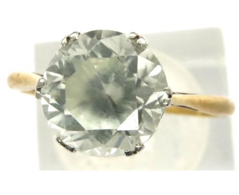 Platinum set solitaire ring with a 9ct gold shank, size P, 3.1g. P&amp;P Group 1 (£14+VAT for the first lot and £1+VAT for su