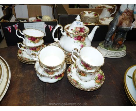 A Royal Albert ''Country Rose'' Teaset including teapot, cups and saucers, etc.