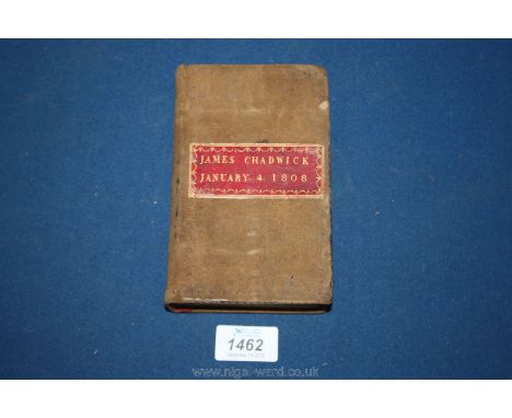 A suede covered 1749 Prayer Book having gold embossed maroon label to the cover ''James Chadwick January 4 1808'' and having 