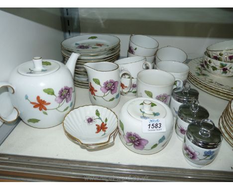 A Royal Worcester Astley part tea set including teapot, sucrier, milk jug, cups, saucers, tea plates, two mugs etc.