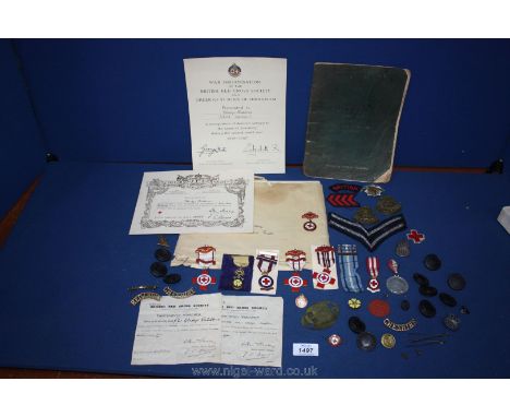 A quantity of Red Cross medals together with associated Proficiency certificates awarded to Gladys Rathbone, and including Ai