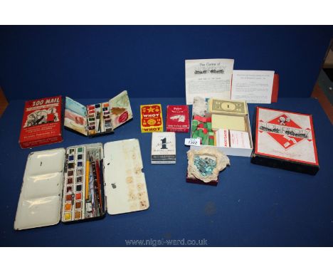Two black tin artist's paint boxes partly full, The Zoo Mail game by Universal Publications Ltd, boxed, three packs of card g