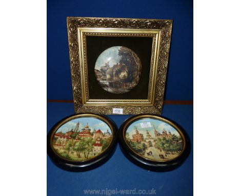 A pair of Russian framed display Plates and a framed ceramic plaque of cows in a stream.