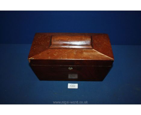 A wooden tea caddy.