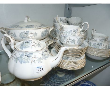 A Royal Albert dinner set and Silver Maple part tea set including two vegetable tureens, teapot, six cups and saucers etc.