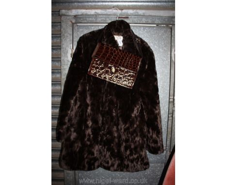 A vintage leather handbag and faux fur coat.