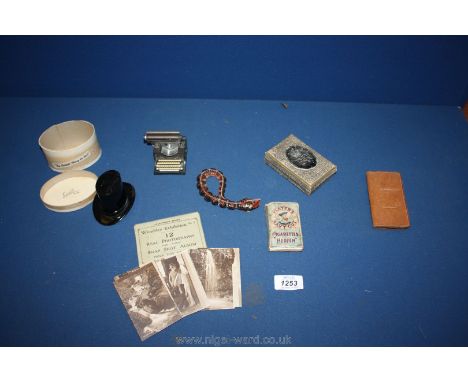 Three packs of vintage Playing Cards with miniature leather snake, a miniature top hat in it's box, a novelty typewriter penc